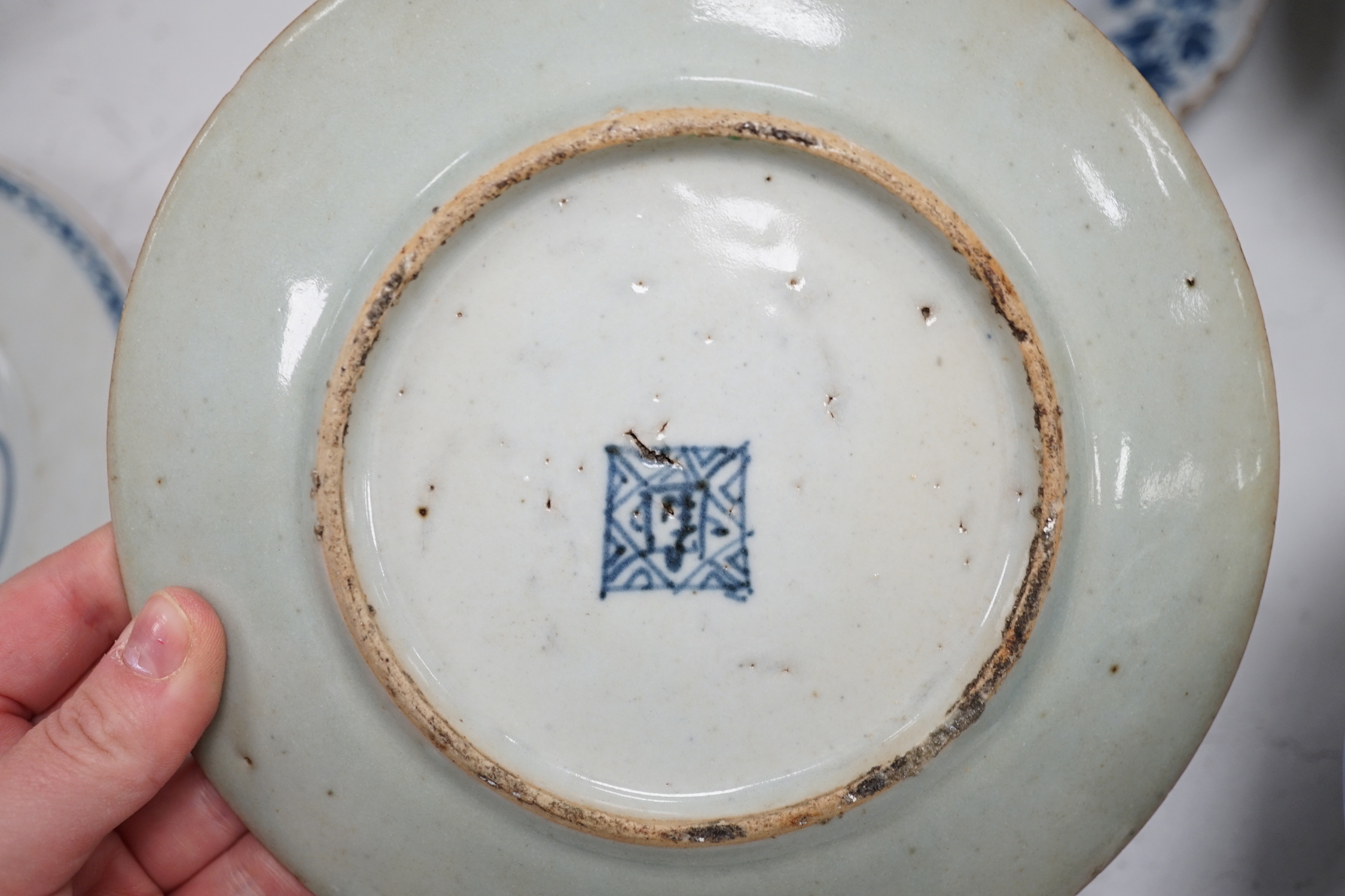 A group of mostly Chinese and Japanese ceramics, 18th century and later together with a Delft plate, tallest 30cm